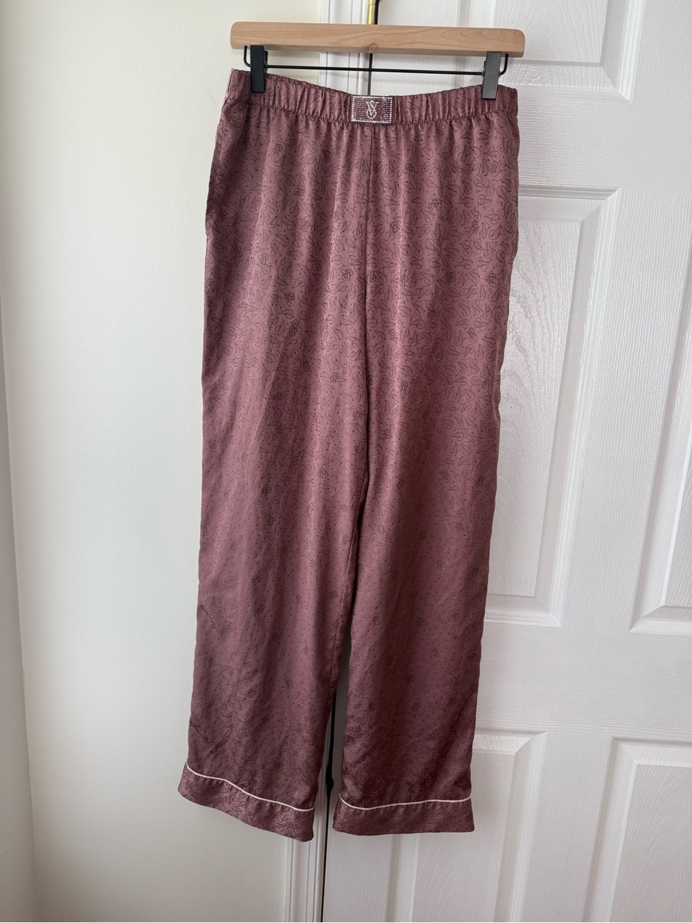 Victoria's Secret pink satin pyjama pants with rhinestone logo detail. Size M